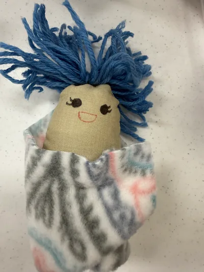 SYNC’s Nifty Needles Group Makes a Big Impact 6 Handmade Doll