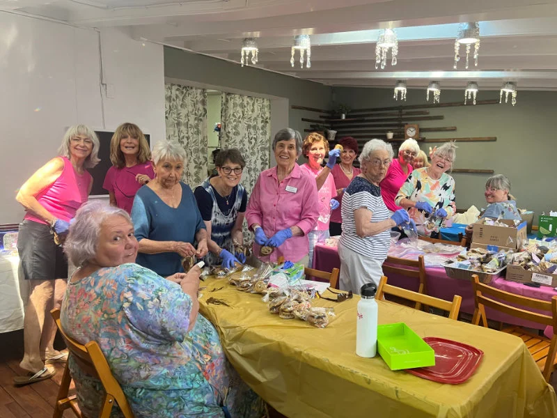 SYNC ladies pack cookies for a InterVarsity Christian Fellowship