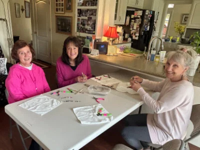 SYNC Group making beaded crosses