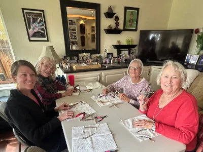 SYNC Ladies making beaded crosses