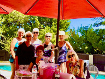 SYNC Ladies enjoying fun in the sun at a pool part