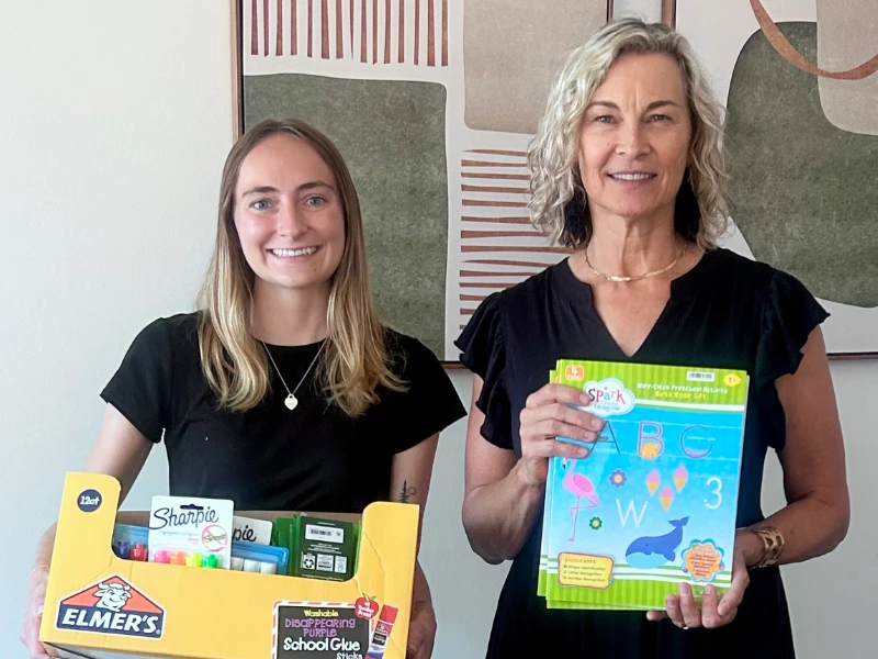 SYNC Ladies provide school supplies for Awaken Kids
