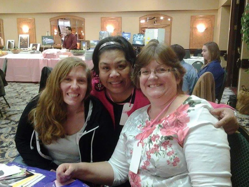 Women gathering at a SYNC event