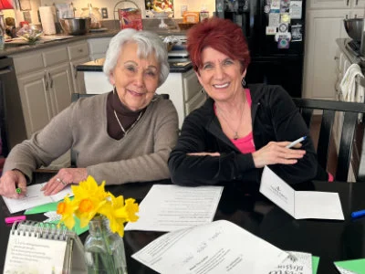 SYNC ladies writing Easter cards