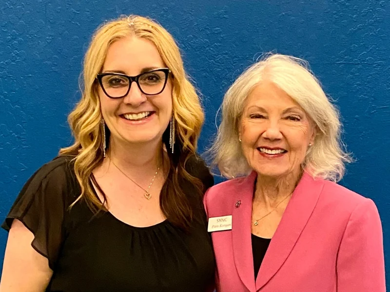 Amanda Brown of Tapestry and Pam Korgan of SYNC