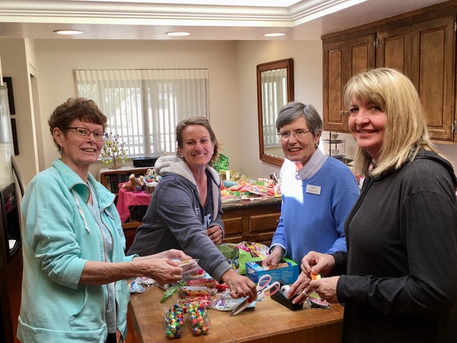 SYNC Volunteers making treats for children of Awaken survivors